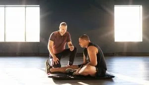 Physiotherapist working with an athlete in the gym at Sherwood Park Acceleration Physiotherapy