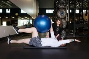 SportsPhysiotherapySherwoodPark Therapist working with an athlete