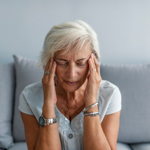 Woman with dizziness, vestibular rehab for vertigo. Acceleration Physiotherapy Sherwood Park