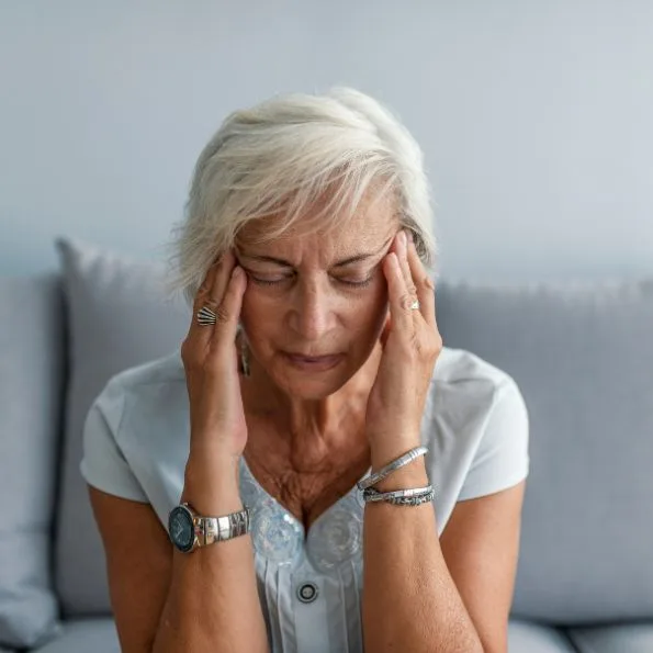 Woman with dizziness, vestibular rehab for vertigo. Acceleration Physiotherapy Sherwood Park