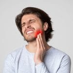 Man with jaw pain